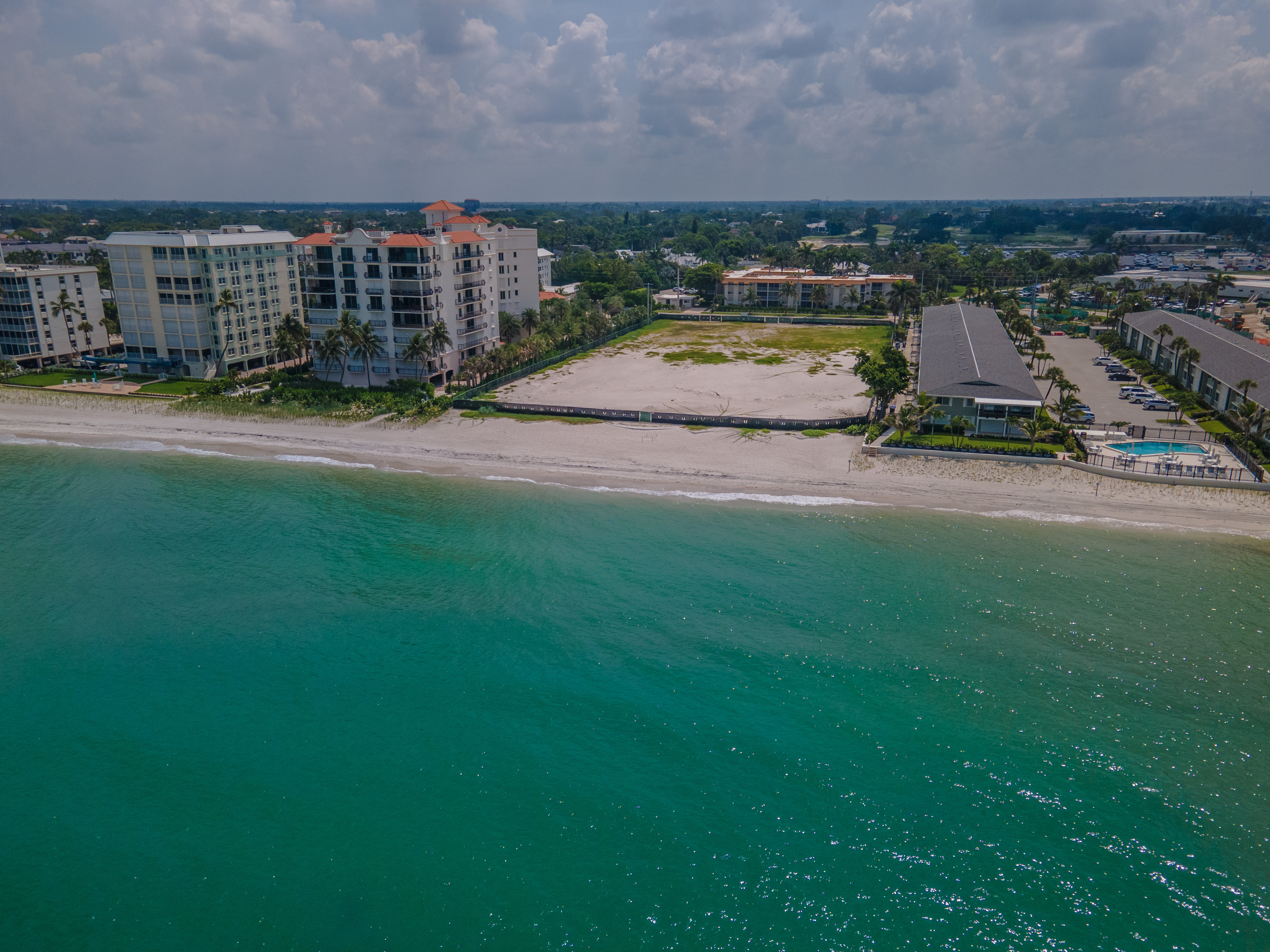 Aerial view of the turquoise Gulf and beach beside the Naples condo
