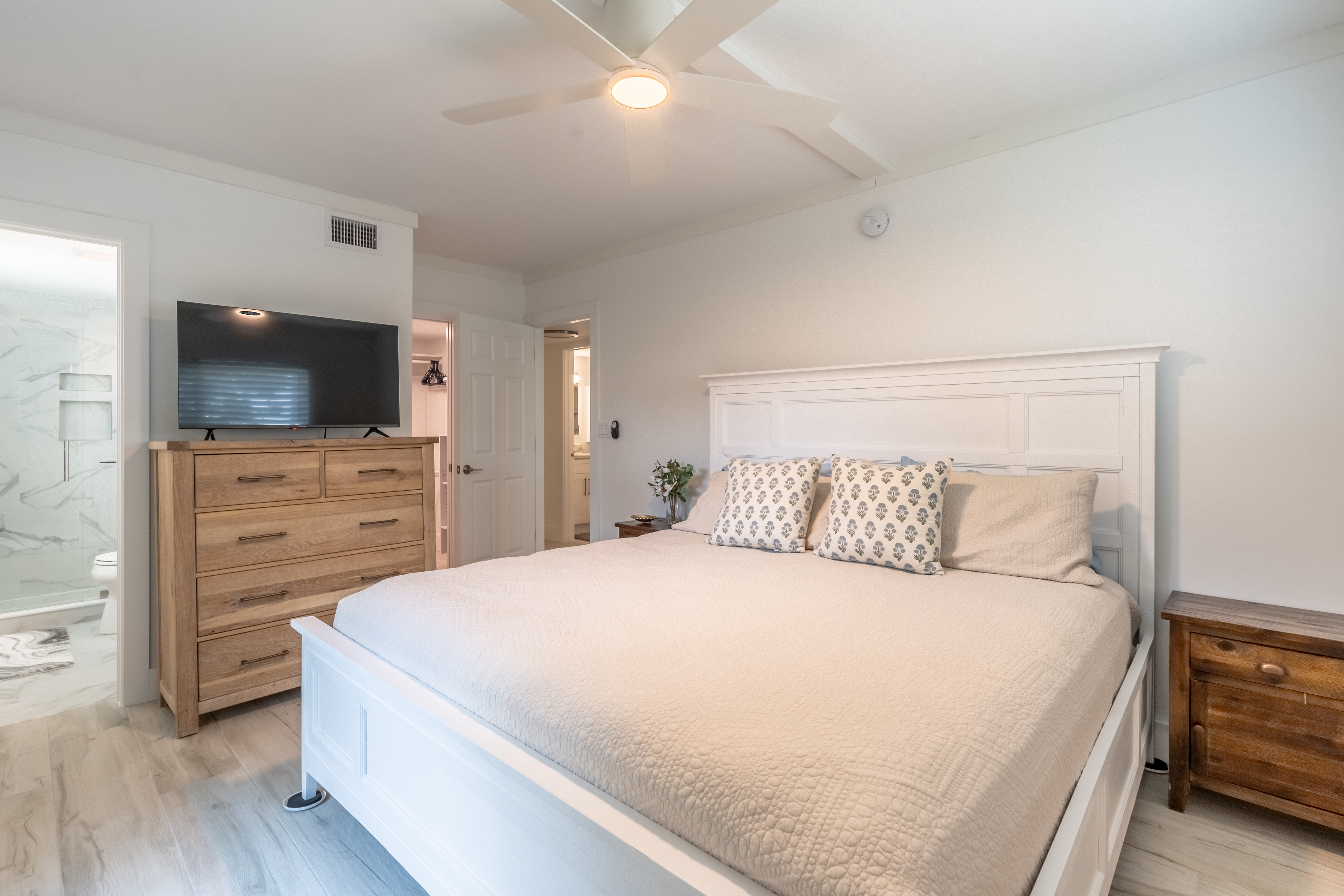 Primary bedroom with king bed and ensuite